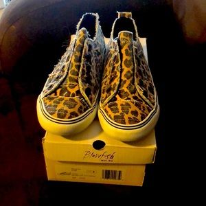 Sneakers slightly worn.  Comes with box in excellent condition.